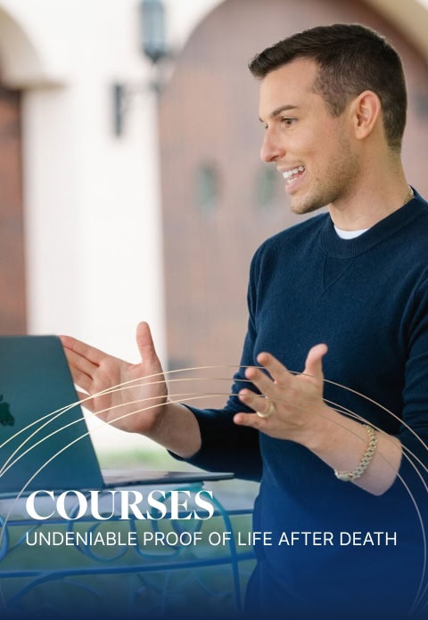 Matt Fraser, dressed in a dark sweater, speaks and gestures while standing next to a laptop. Text overlay reads, "COURSES: UNDENIABLE PROOF OF LIFE AFTER DEATH.