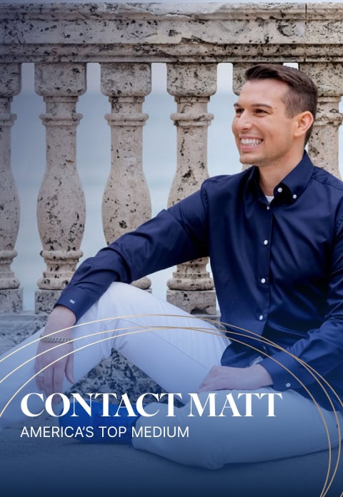 Matt in a blue shirt and white pants sits smiling in front of an ornate stone railing. Text overlay reads, "CONTACT MATT FRASER, AMERICA'S TOP MEDIUM.