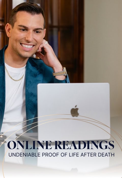 Matt Fraser in a blue blazer smiling at a laptop screen. Text at the bottom reads, "Online Readings - Undeniable Proof of Life After Death with Matt Fraser.